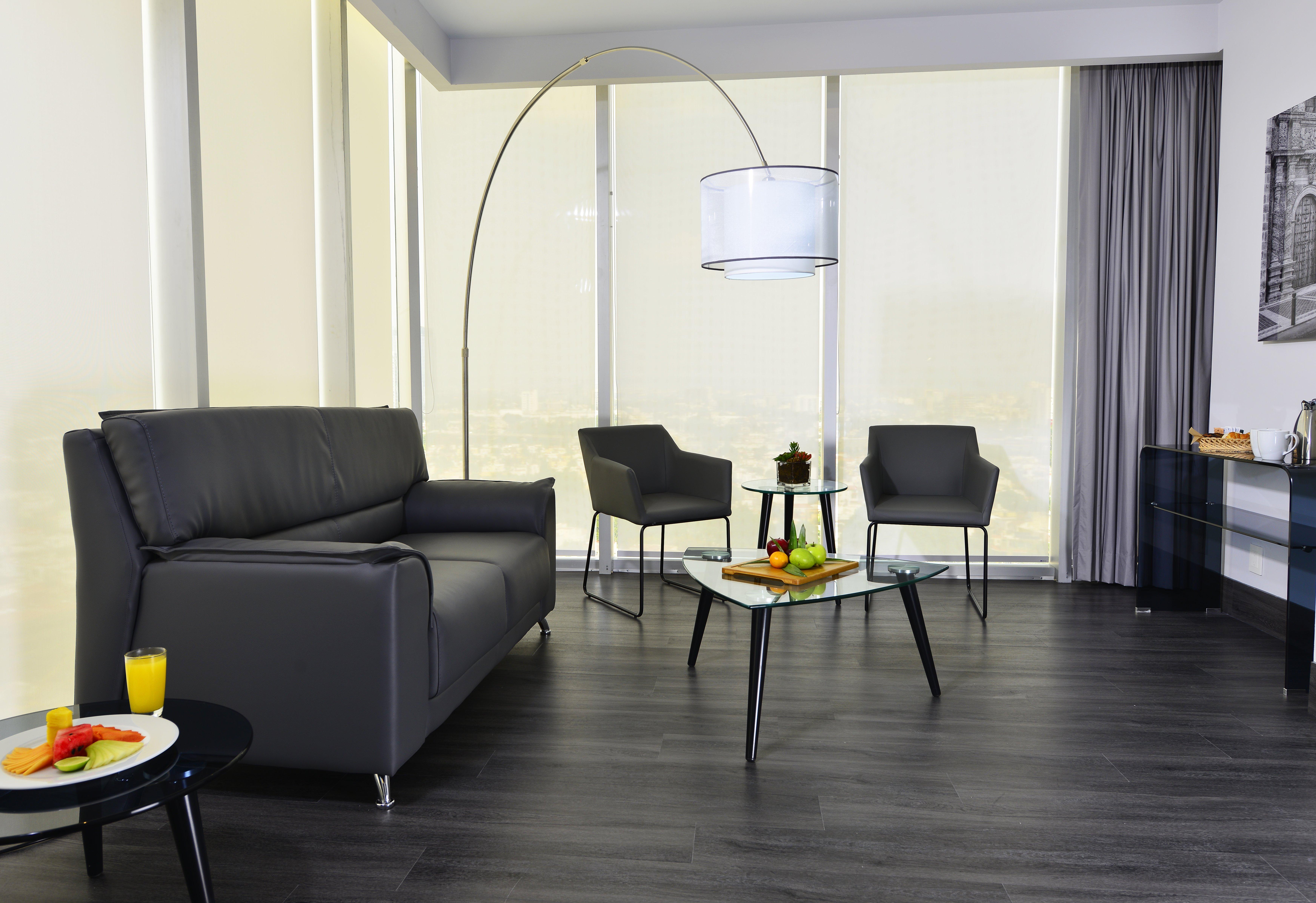 Baruk Guadalajara Hotel De Autor Esterno foto A living room with a floor lamp